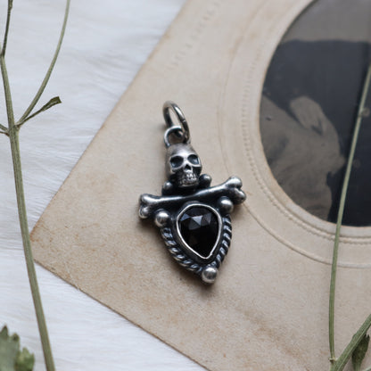 Sacred Remains Charm